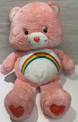 pink care bear with rainbow