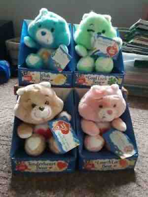 Vintage 1980's set of 4 Care Bears in boxes with tags.Â 