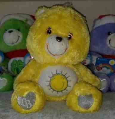 CARE BEARS Funshine Bear 2007 Swarovski Crystal Eyes 25th Anniversary