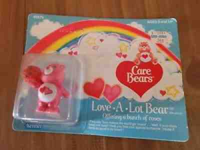 1982 Care Bears Love A Lot Bear Mini Fig â??Offering A Bunch Of Rosesâ?. Unopened.