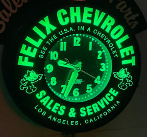 Felix Chevrolet  22" Curtis Neon Clock. W/Green neon & Marquee