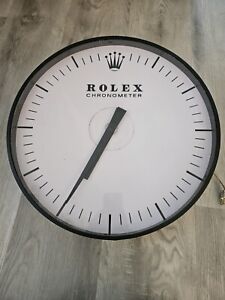 Vintage Rolex wall clock circa 1965. size 20.5 inches 4 inches in height.