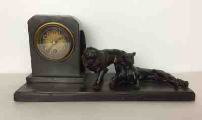 Antique bronze clock with bronze lions decoration 1930'