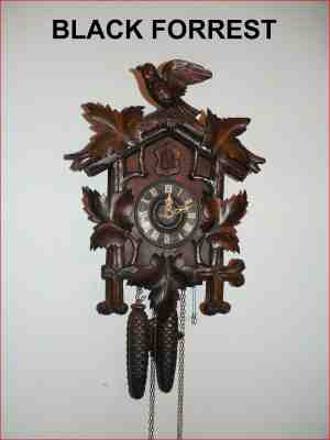ANTIQUE BLACK FORREST CUCKOO ---NICE CARVINGS-- BONE HANDS-WORKS VERY WELL