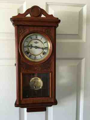 USED VINTAGE CENTENNIAL PARLOR WOOD WALL CLOCK, WIND-UP & KEY AND CHIMES #B0628