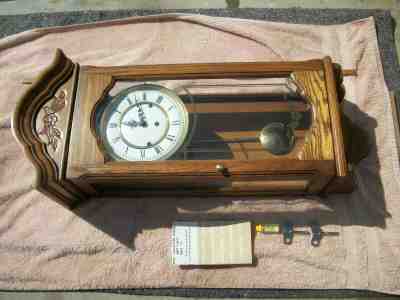 Howard Miller 612-578 Wall Clock Oak 8 Day Key Wound Hermle Triple Chime