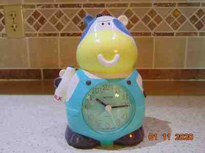 Rhythm Alarm Clock COW, Says Wake Up Don't Sleep Your Life Away