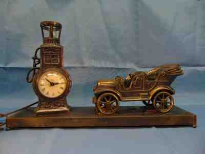 Vintage United Metal Goods Clock Car and Lite Gas Pump Works