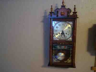 Stylish Day and Date 31day wind striking wall clock reconditioned tested runs 