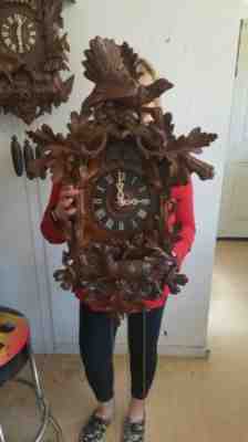 Beautifully carved  antique cuckoo clock