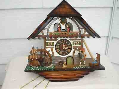 New German cuckoo clock 8 day movement Chalet style with Swiss musical movement