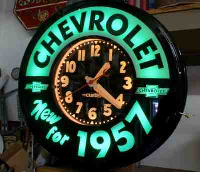 A 22" Deluxe Twin tube, 1957 Chevy, . Dealers  Neon Clock
