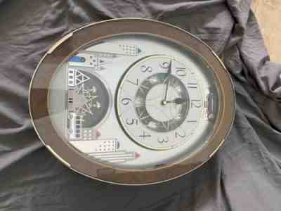 Rythym Singing Clock Small World