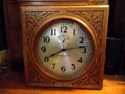 RARE ANTIQUE WESTERN UNION SELF WINDING PENDULUM CLOCK EMBOSSED OAK CASE RUNS