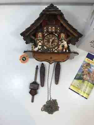 Cuckoo Clock Black Forest house with moving wood chopper 169519914 NEW