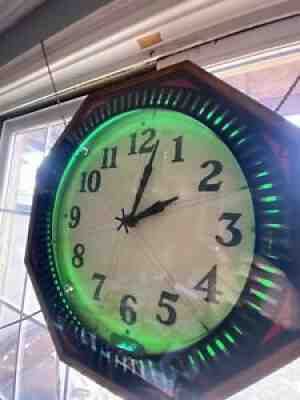 Pinwheel Electric neon clock vintage 8 sided oriignal face sign runs Great!!