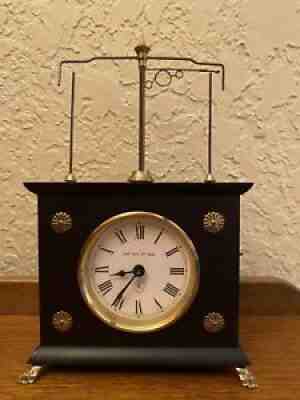 The Horolovar Flying Pendulum Ignatz Clock. Vintage Jerome and Company.Â 