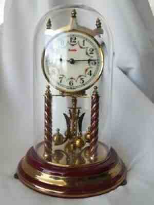 VINTAGE KUNDO ANNIVERSARY CLOCK nice colonial red base and serpentine pillars