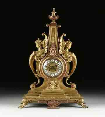 A NAPOLEON III BRONZE/ BRASS AND COPPER MANTEL CLOCK, CA 1870!