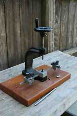 K & D clock repair persons bushing machine