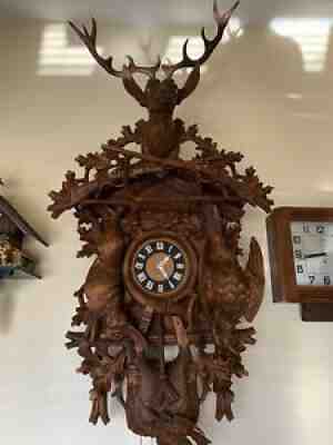Large Hunter Black Forest Carved Cuckoo Clock . SUPPER LARGE