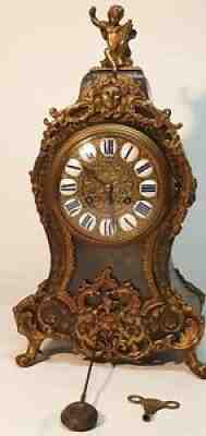 ANTIQUE FRENCH BOULLE AND BRASS MOUNTED CLOCK
