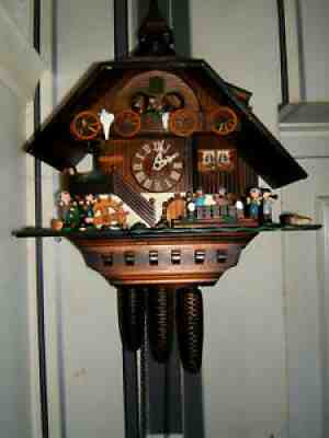 Animated Black forest 8Day Cuckoo/ Musical 3 Weight clock by Hubert Herr Germany