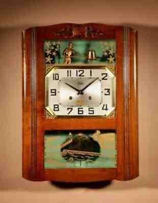 Italian Interest Automaton Large Oak Signed Odo Striking Wall Clock.