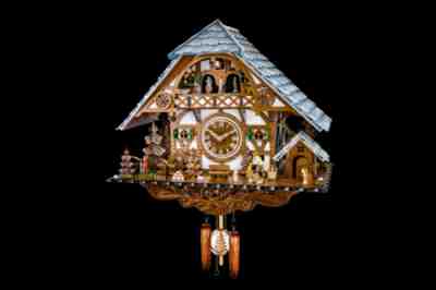 cuckoo clock Black Forest big farm house style moving wood chopper music quartz