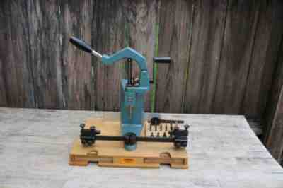 K W M bushing machine + bushings, tooling & kwm gauge , light use on this mach.