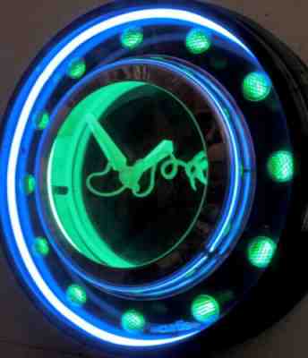 A Curtis, 22" Neon clock "Moon Emeralds" 3 tubes, 2 Transformers, W/Dim
