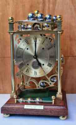 Spherical Weight Skeleton Clock by Harding and Bazeley Ltd