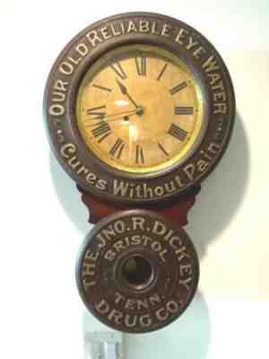 EDWARD BAIRD " OLD EYE-WATER" ANTIQUE ADVERSTISING CLOCK CIRCA 1890