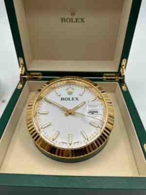 ROLEX. A RARE AND VERY HEAVY GILT BRASS DISPLAY DESK CLOCK WITH SWEEP CENTRE