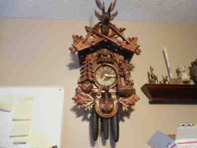 German Black Forest Musical Hunter Cuckoo Clock With Dancers nearly new, 8 day