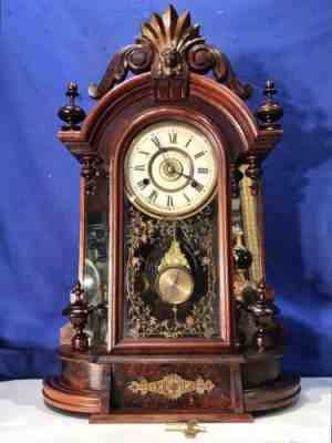 1879 ANTIQUE TRIUMPH NEW HAVEN STRIKES,ALARM TRIUMPH MIRROR FINIALS SIDE CLOCK