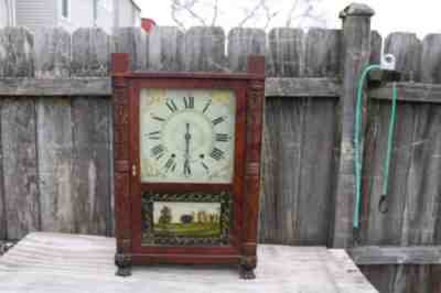 early period camerican wooden works shelf clock , mark leavenworth.