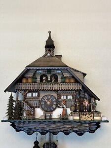 HONES FAMOUS HUSLI 8 DAY CUCKOO CLOCK . 22 INCHES. SEE ON YOUTUBE.