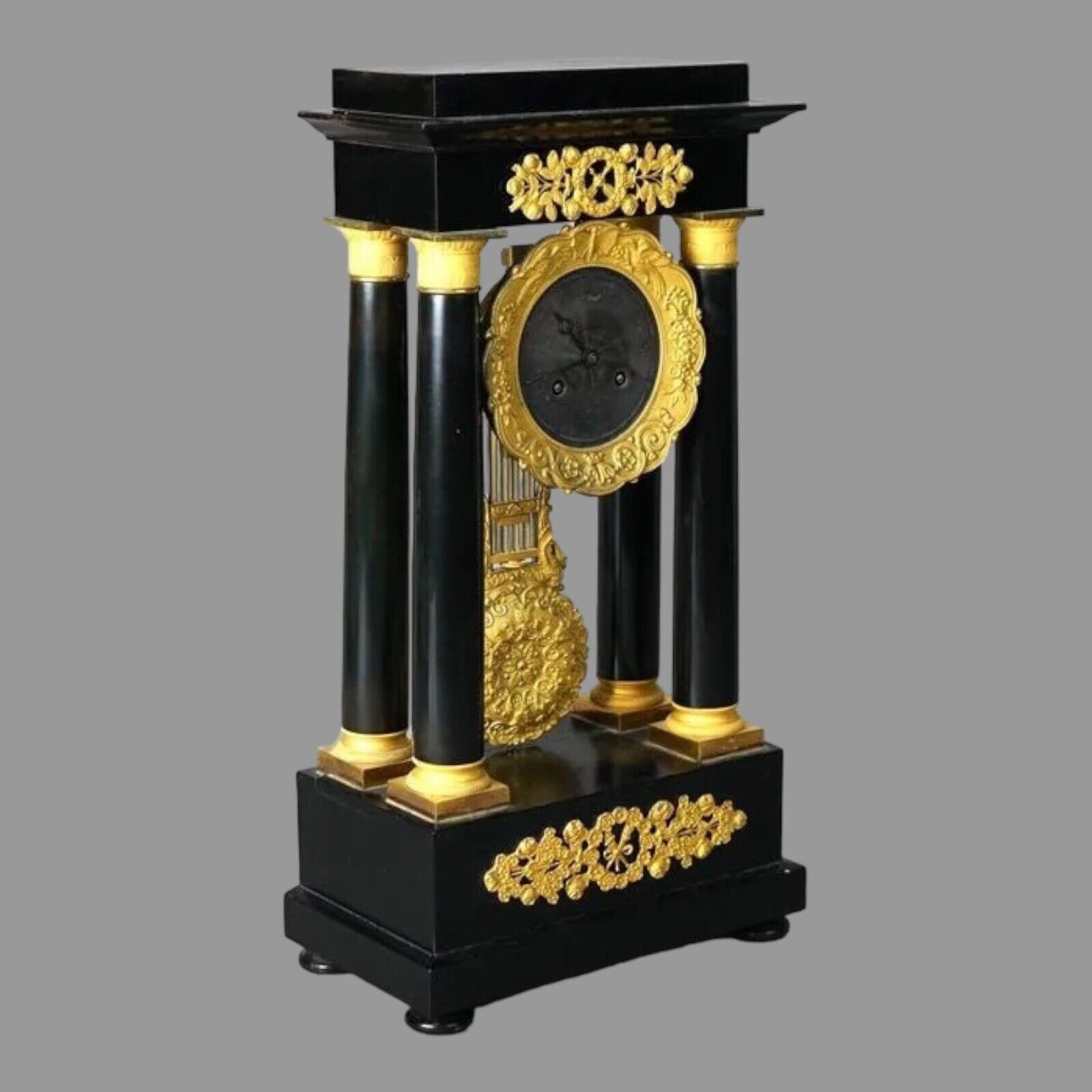 Antique French Empire Ebonized & Ormolu Decorated Mantle Clock