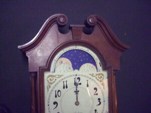 Antique Seth Thomas wall clock, with double weights and pendulum