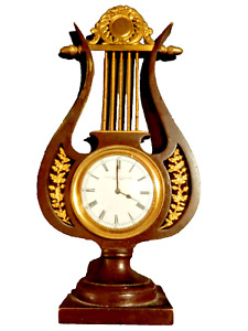 ? Omega Clock Circa 1915. E.F. Caldwell & Co. Bronze Lyre Form case. Beautiful!