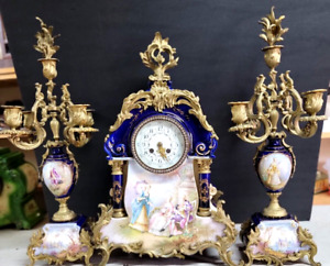 VINTAGE FRENCH PORCELAIN BRONZE LARGE MANTEL CLOCK AND CANDLELABRAS