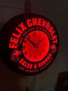 Felix Chevrolet  22" Curtis Neon Clock, in Neo Ruby Red.  SEE the USA