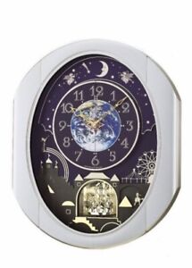Small World Rhythm Peaceful Cosmos Melodies Wall Clock Magic Motion Made InJapan