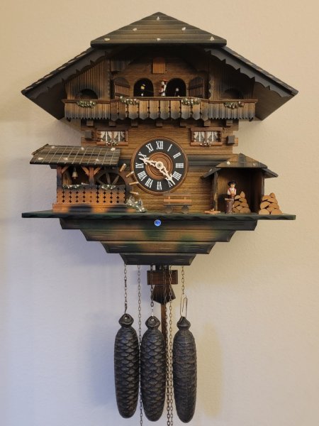 New ListingVINTAGE XL GERMAN BLACK FOREST CHALET CUCKOO CLOCK- MUSIC, DANCERS, WHEEL. WORKS