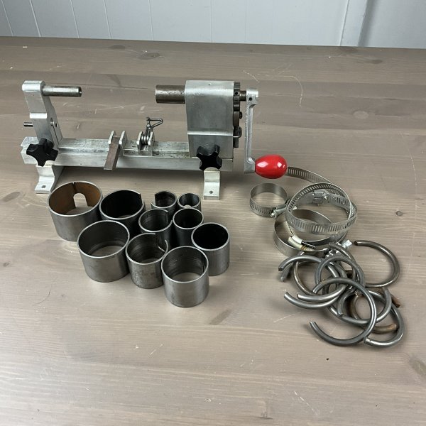 ollie baker clock repair spring winder w/extras. clock repair tooling.