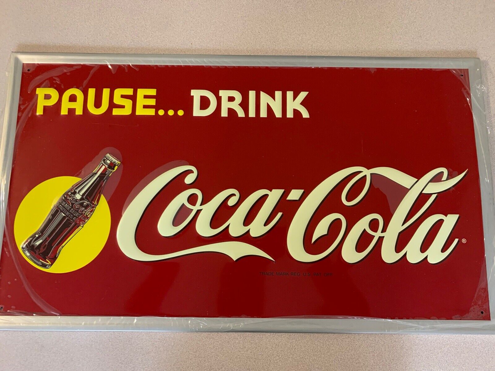 Pause…Drink Coca-Cola. (C) 2006 The Coca-Cola Company. ?