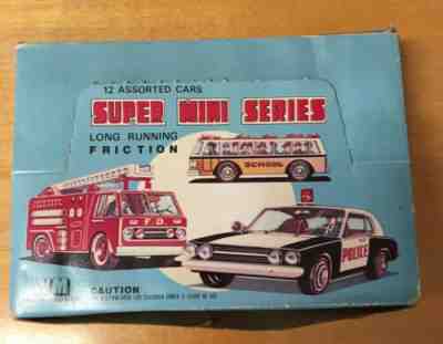 COCA COLA SUPER MINI FRICTION TRUCKS 1980 BRAND NEW IN DISPLAY BOX  (12 TOTAL)