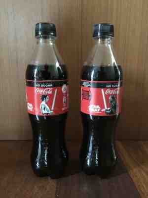 Star Wars Coca-Cola bottle from Singapore. Light up saber (red and blue)