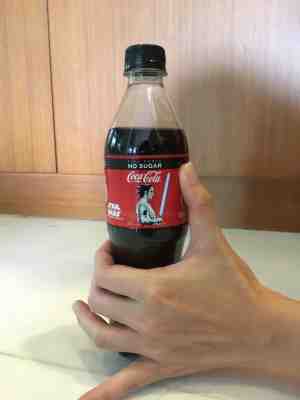 Star Wars Coca-Cola bottle from Singapore. Light up saber (blue)